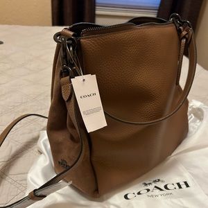 Coach Shay in pebble leather and suede.  Vintage khaki is the color.